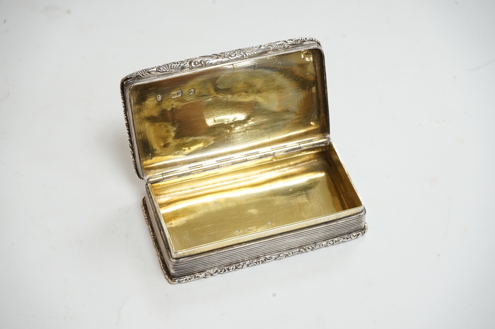A William IV engine turned silver rectangular snuff box, by William Pugh, Birmingham, 1831?, 72mm.